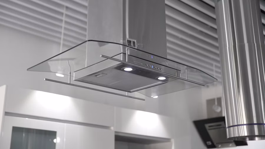 Kitchen chimney hood installed above a stove